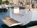 The bathing platform is not pre-balanced, so getting on and off requires strength. The tailgate is only available for an extra charge