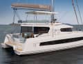 Quite high. Flybridge and bimini need space. The main boom is attached at a lofty height.