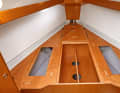 Bavaria Cruiser 33: Storage space under the sunbed is limited. The water tank is installed right at the front