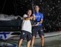 Armel Le Cléac'h and Sébastien Josse pop the champagne cork together at the finish line