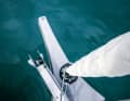The forestay is set as far forward as possible.  A bowsprit is available with the recommended first-line or downwind package