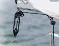 Dinghy mainsheet: An adjustable Dyneema triangle on the foot block serves as a traveller. The tackle is operated from the top of the boom