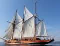 The ship has 540 square metres of sail area, and the large broad jib is set for rough winds