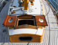 The forward hatch opens to the side with two flaps and is fitted with portholes