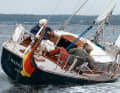 Long, slender lines and little freeboard: crew to leeward sits close to the water with a clear view forwards