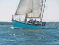 The partially restored wooden long keeler underway on the Solent, where Rose lived, started and finished his round-the-world voyage