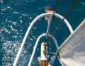 Rough goods: an iron pulpit, parallel teak bars and a short bowsprit - when yachts and fishing boats still resembled each other