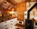 Friesenstube: Self-designed tiles, stove, a fully-fledged bar and galley are rarely found on a small cruiser