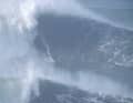 Monster waves as a tourist and surfing attraction in Nazaré, Portugal