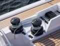 The new cockpit design also allows an improved arrangement of the winches. All sheets, halyards and trim lines are led back to the steering columns