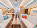 Simple, functional, but not uncomfortable. The lounge is bright and cosy in the visualisations