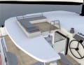 A flight of stairs leads directly from the helm to the cabin roof and the lounge.