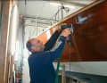The boat is made of carbon sandwich veneered with wood
