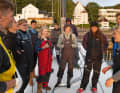 In the morning in Kiel's old Olympic harbour, the atmosphere at the safety briefing is relaxed and cheerful. Skipper Gesine Wutzler, on the far right of the picture, is one of the older people on board at the age of 21
