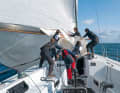 Handling the huge sail surfaces requires full attention and a lot of practice