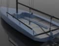 The gennaker is set from a "launcher" in the foredeck. The hole in the deck is not yet shown in the illustration