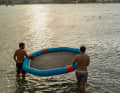 The Party Pool consists of an inflatable ring that holds the net taut.