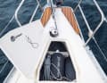 Delphia 34: Forward-opening pulpit, plus side steps: a perfect arrangement for boarding or disembarking via the bow. The forepeak is divided: Anchor locker forward, small load for fenders and sheets aft - great