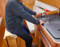 Delphia 34: You can lean against the saloon table while working in the galley