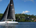 The tall, slim carbon fibre rig is positioned far back in the boat. The forestay is also set noticeably far back