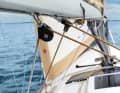 Dufour 350: The mainsheet is run in front of the companionway via a cockpit runner. This requires force and does not bring the boom into the centre as desired