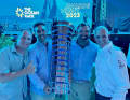 Happy ending after the crash in The Hague: "Guyot" team manager Jens Kuphal (right) and co-skipper Robert Stanjek (left) on stage with 11th Hour Racing's victorious skipper Charlie Enright and US team boss Mark Towill