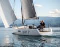 Spacious. Plenty of space in the long, open cockpit, even for more than just two. There is plenty of storage space aft