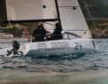The hull has very little freeboard. You sit very close to the water, similar to a dinghy