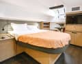 The cabins at the stern are almost opulent and feature large island beds