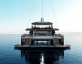 The FPY120S viewed from the rear; all three decks are clearly visible. The outer teak platforms on the water can be folded up.