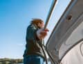 A stainless steel bracket on the sprayhood provides a good grip when stepping onto the running deck