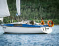 The high forecastle deck creates space, its blue colouring sets it apart from the hull and conceals its height