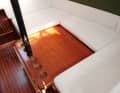 Lowerable table creates a large sea berth