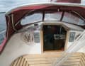Bridge deck: You can make yourself comfortable under the sprayhood on the wide area. You can lie or sit safely there