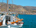 Fishing boat in the main ferry harbour of Pothia.
