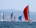 Alla Grand Soleil Cup, la flotta Grand Soleil fa bella mostra di sé al largo della costa sotto vele colorate.