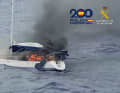 The yacht catches fire again and sinks.