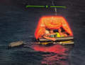 André Engelhardt with his three co-sailors in the life raft