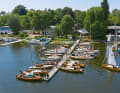 The smaller boats can be moored at the jetty in front of the boathouse