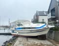 After the storm surge: motor yachts on the promenade