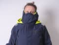 The collar extends to the back of the head, the storm flap over the nose.