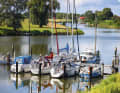 Impressions from the Hooksieler Binnentief, also known as the Hooksmeer. WSV Hooksiel jetty, in the background the path to the old harbour