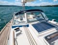 The type-retaining fixed windscreen and the high, all-round cockpit coaming offer good protection for the crew