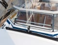 The mainsheet traveller was not up to the load. The car hooked and was difficult to haul even with the winch