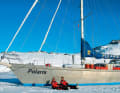 Arrived: The Haferkamp family in front of their ship in the ice off Greenland. The large water tanks are empty to protect them from the frost. Thawed snow serves as drinking water
