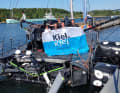 Shortly before casting off in Kiel, Kiel's Lord Mayor Ulf Kämpfer bids farewell to Team Guyot after successful repairs in Kiel