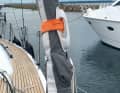 A handle (here an inflatable spare part), clipped to the forestay, can make it easier to get on board. The gennaker halyard on the bow platform or bowsprit also helps