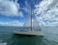 The self-tacking jib is standard. The sails are not yet included in the basic price