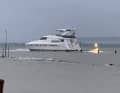 Minutes later, the large motorboat had drifted out of the harbour
