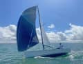 Sportier with gennaker. Additional space sails are attached to the rather long, fixed bowsprit